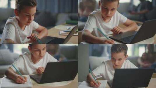 男孩，笔记本电脑，家庭学习，家庭作业高清在线视频素材下载