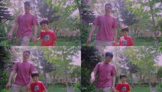 快乐的父子在院子里玩耍高清在线视频素材下载