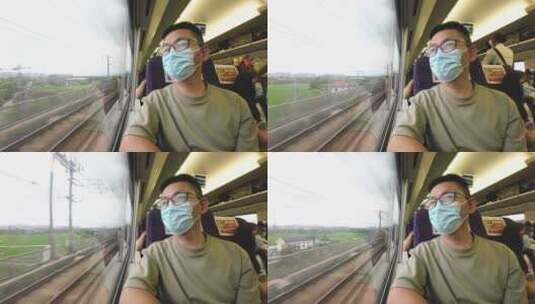 新冠病毒疫情中年男性乘客在高铁上看窗外高清在线视频素材下载
