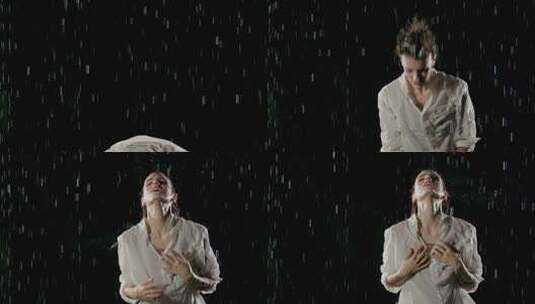 美丽的女人在雨中跳舞高清在线视频素材下载