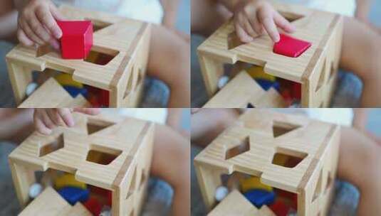 小女孩在家里玩生态木制玩具高清在线视频素材下载