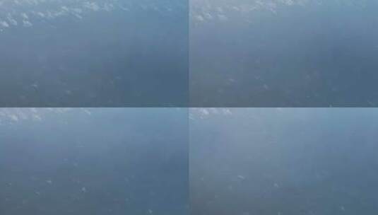 飞机上俯拍大海高清在线视频素材下载