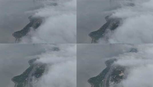 云端上的深圳湾超总基地在建工地航拍空镜高清在线视频素材下载