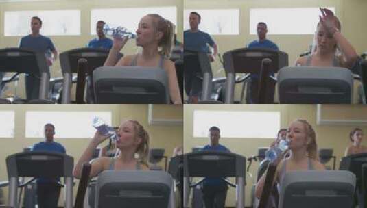 女人在健身房喝水高清在线视频素材下载