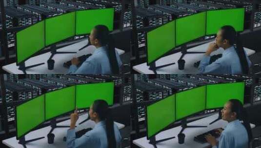 亚洲女性在数据中心模拟多台电脑显示器时思高清在线视频素材下载