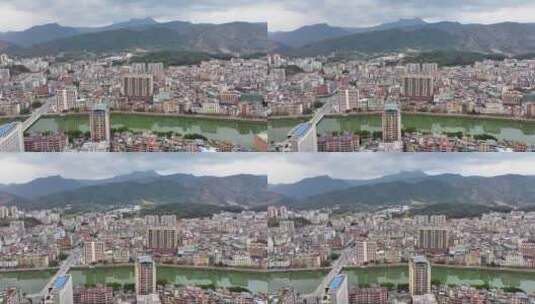 航拍广东香格里拉云髻山下的新丰县城市风光高清在线视频素材下载