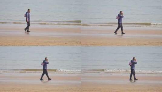 青岛海边行走男人高清在线视频素材下载