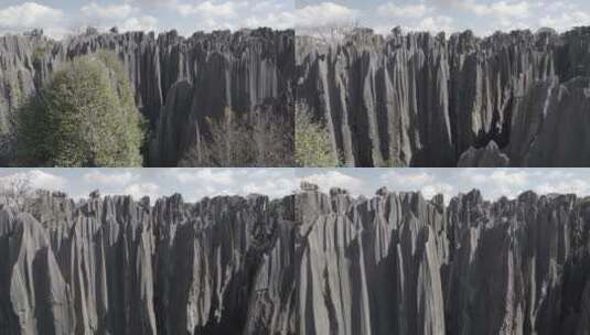 云南昆明石林风景区喀斯特溶岩地貌风光航拍高清在线视频素材下载