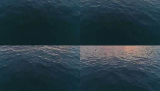 俯瞰深蓝色的大海和粉红色的落日倒影高清在线视频素材下载
