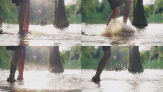 夏天男孩在池塘玩水，溅起水花4k视频素材高清在线视频素材下载