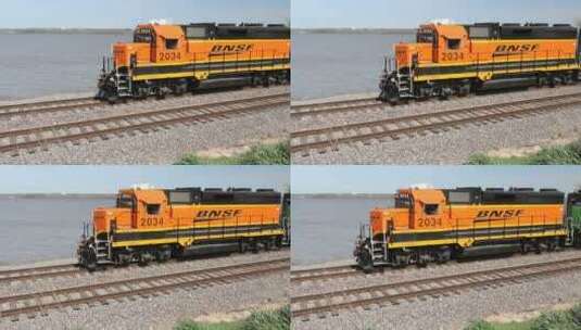 火车慢镜头驶过密西西比河的铁轨高清在线视频素材下载
