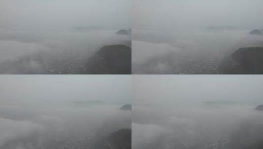 云雾缭绕中的贵州省镇远古镇航拍风光高清在线视频素材下载