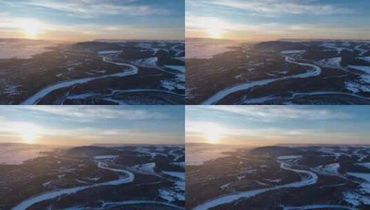 航拍冬季雪原河湾日落高清在线视频素材下载