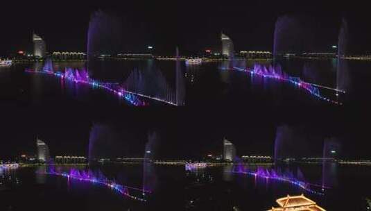 航拍鄂州夜景水上激光音乐五彩喷泉高清在线视频素材下载
