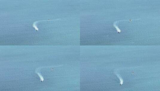 航拍蓝色大海上极限运动飞翔滑翔伞高清在线视频素材下载