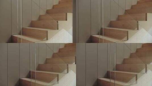 现代简约家居室内装饰，配有优雅的木制楼梯高清在线视频素材下载