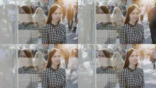 光芒四射的阳光下，女人在熙熙攘攘的城市街高清在线视频素材下载