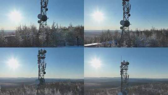 大兴安岭寒冬山巅雪林微波站高清在线视频素材下载