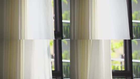 风吹窗帘窗户白色窗帘飘动阳光透过白色窗帘高清在线视频素材下载