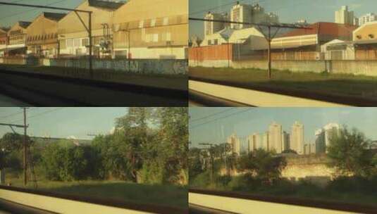 从火车窗户观看沿途城市建筑高清在线视频素材下载