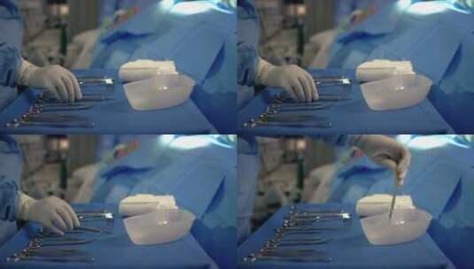 手术室的医务人员拿起手术刀高清在线视频素材下载