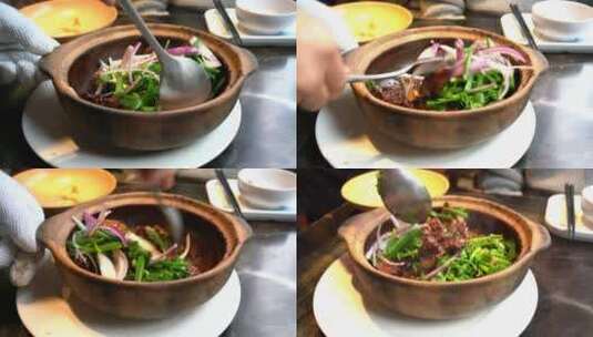 搅拌美味菜肴牛肉冻锅高清在线视频素材下载