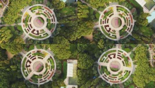 航拍城市绿化公园圆形园艺广场高清在线视频素材下载