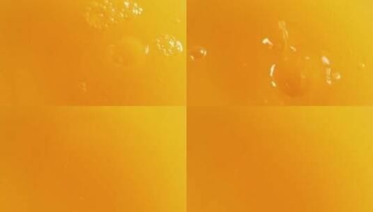 滴落的橙汁水滴高清在线视频素材下载