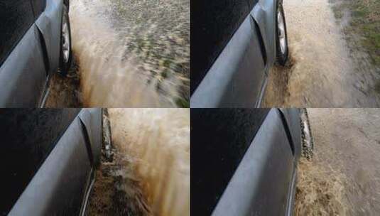车辆行驶在过水路面溅起水花泥土高清在线视频素材下载
