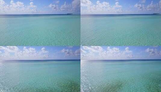 白色沙滩天堂海滩和水蓝色彩色水背景的日间无人机岛屿景观高清在线视频素材下载