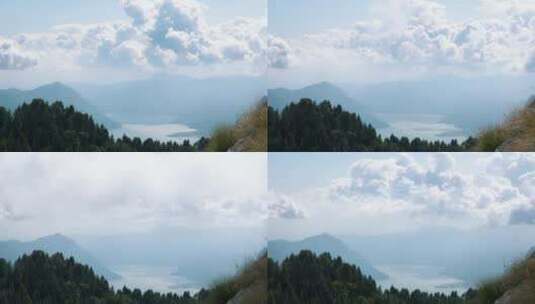 伊势湖山脉中的延时摄影，显示云在山脉和湖水上移动高清在线视频素材下载