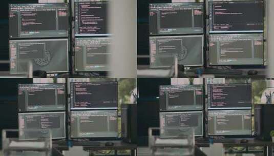 在空软件IT代理台中显示编程代码的多个屏幕高清在线视频素材下载