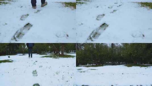 雪地上行走的人的脚印高清在线视频素材下载