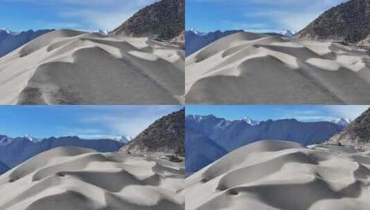 西藏林芝佛掌沙丘蓝天白云雪山河流湖水沙滩高清在线视频素材下载
