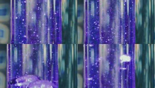 抽象紫色液体气泡创意宏观背景紫色液体的特高清在线视频素材下载