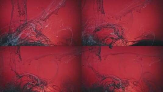 黑色油漆在红色背景下掉入水中高清在线视频素材下载