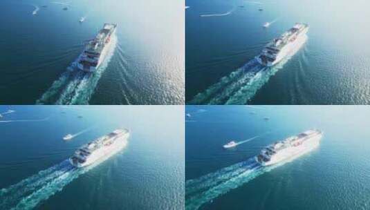 海南三亚蔚蓝色海洋上正驶向远方的豪华游艇高清在线视频素材下载
