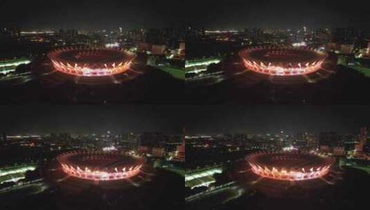 广东佛山世纪莲地标建筑夜景灯光航拍高清在线视频素材下载