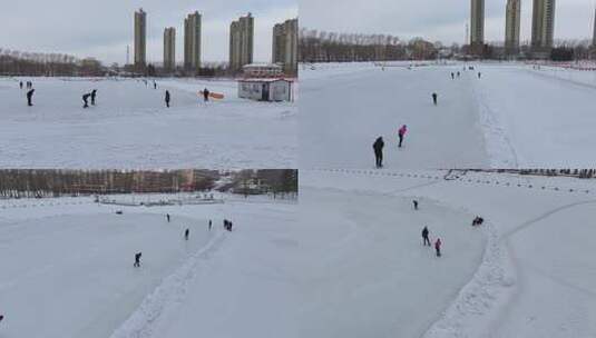 俯拍雪地冰场全景 有人在冰面活动高清在线视频素材下载