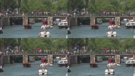 行人和河面上的小船高清在线视频素材下载