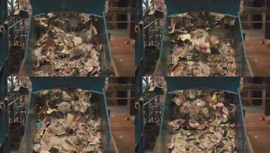 纸制品在回收中心被处理高清在线视频素材下载