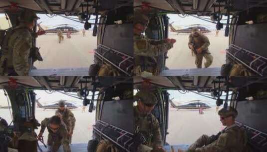 美国巡逻队成员带着军犬走向飞机高清在线视频素材下载