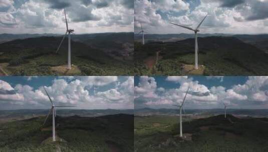 风力发电视频蓝天白云下旋转的发电风车高清在线视频素材下载