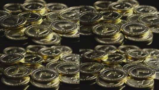 一堆旋转的小硬币高清在线视频素材下载