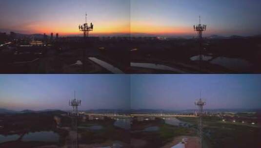 航拍夕阳下的信号塔高清在线视频素材下载