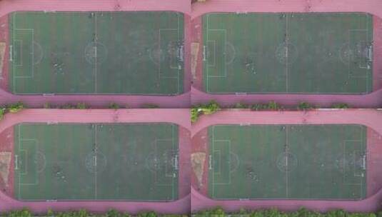 航拍校园环境学生足球场踢足球高清在线视频素材下载
