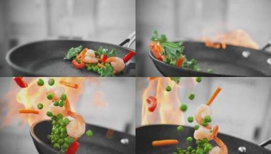 平底锅大火爆炒蔬菜的慢镜头特写高清在线视频素材下载