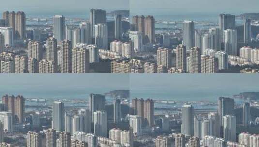 长焦航拍蓝天白云之下的威海高新区城市景观高清在线视频素材下载