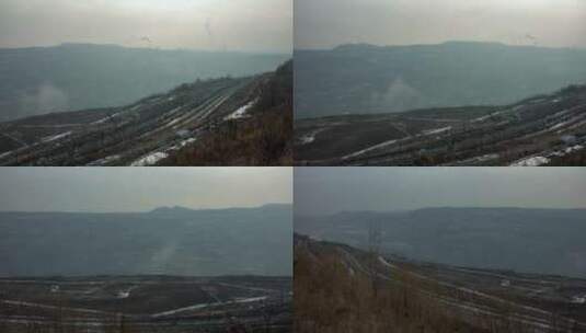 抚顺西露天煤矿矿坑冬季雾霾高清在线视频素材下载