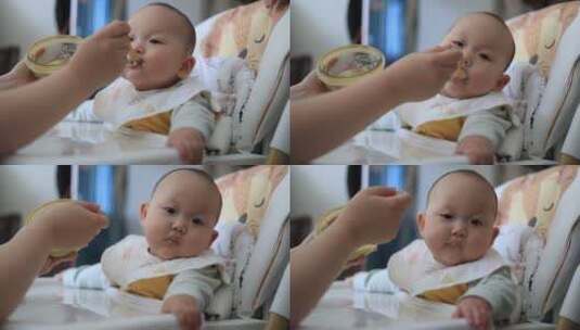 婴儿吃辅食米粉喂饭高清在线视频素材下载